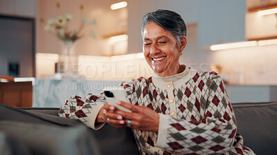 Buy stock photo Phone, relax and woman on sofa in home with reading blog for news update, social media or texting. Happy, technology and mature person with cellphone for website notification on mobile app in house.