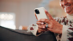 Phone, hands and woman on sofa in home with reading blog for news update, social media or texting. Relax, technology and mature person with cellphone for website notification on mobile app in house.