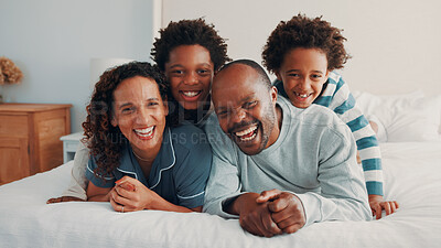Buy stock photo Fun, stack or black family on bed with portrait, loving connection or bonding together on day off. Smile, parents or children in house with love, happy relationship or playful moment on weekend break