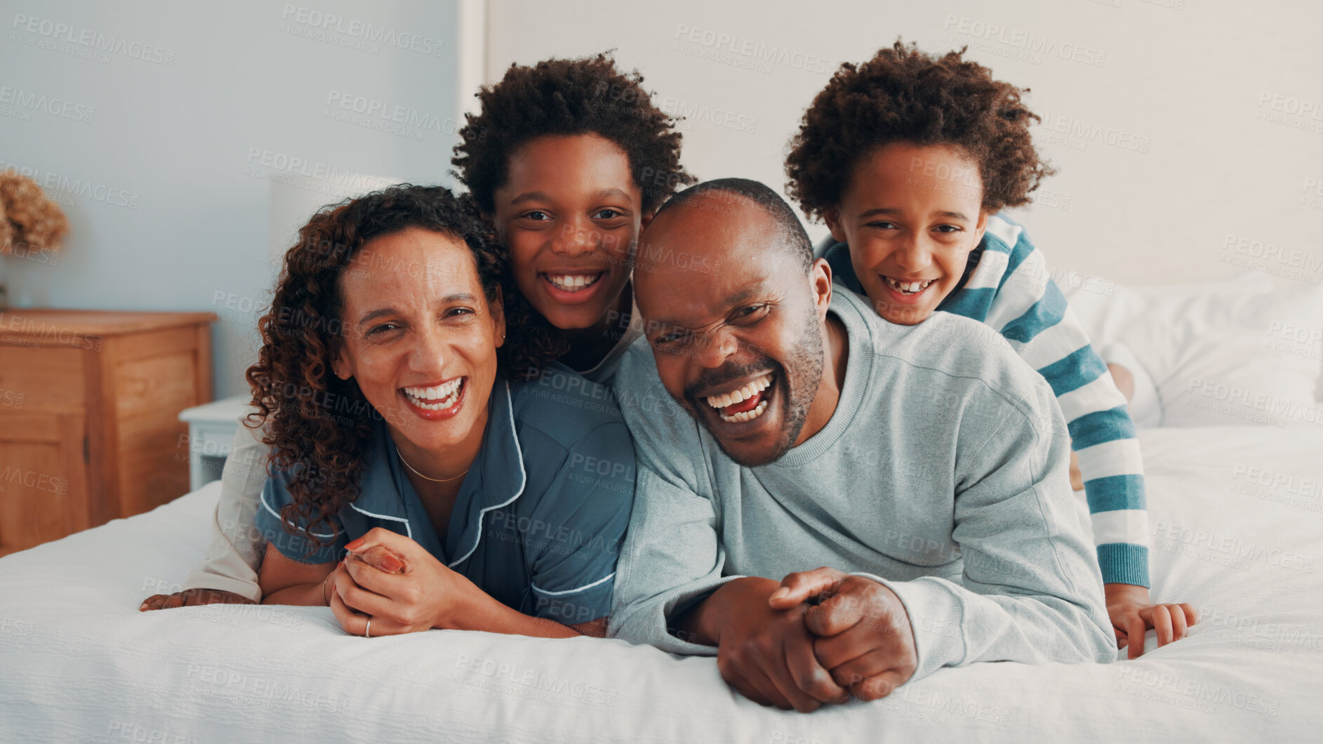 Buy stock photo Fun, stack or black family on bed with portrait, loving connection or bonding together on day off. Smile, parents or children in house with love, happy relationship or playful moment on weekend break
