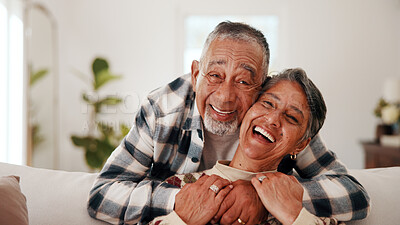 Buy stock photo Hugging, laugh and portrait of old couple on sofa in living room together for bonding or retirement. Excited, funny and love with senior people embracing in home for care, support or wellness