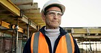 Thinking, man and engineer outdoor for construction, inspection and vision for architecture. Smile, mature person and safety gear at site with reflection, quality assurance and building development