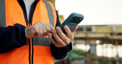 Buy stock photo Construction, message or hands on worksite with phone, task instruction or inspection report in online chat. Texting, space or engineer with tech, project brief or operations schedule on digital app.