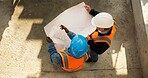 Team, above or engineer at construction site with blueprint, development review or schematic discussion. Top view, people or document for architecture design, building planning or strategy evaluation