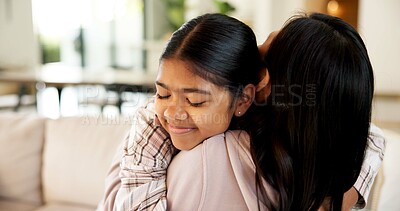 Buy stock photo Hug, love and girl with mom in home for bonding, healthy relationship and security for parenting. Family, happy and mother with child embrace for affection, connection and support for trust in house