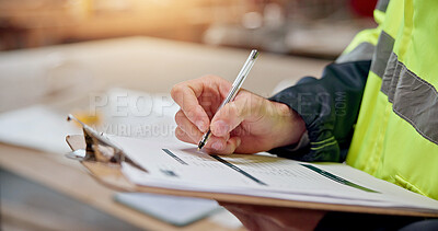 Buy stock photo Clipboard, writing and engineer with hands in warehouse for furniture quote, stock review or planning. Manufacturing checklist, contractor invoice and evaluation with person in factory for project