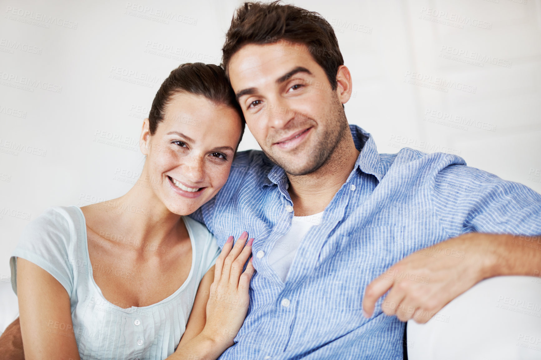 Buy stock photo Relax, portrait and smile with couple on sofa for romance, bonding and support together. Calm, love and relationship with man and woman in living room of home for marriage, happiness and care