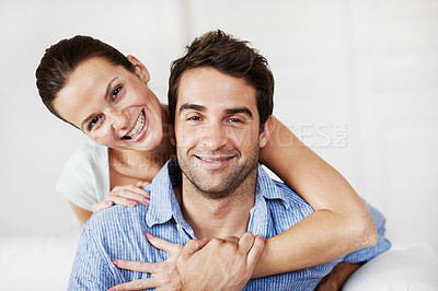 Buy stock photo Portrait, hug and smile with couple on sofa for romance, bonding and support together. Calm, relax and relationship with man and woman in living room of home for marriage, happiness and care