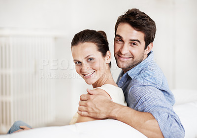 Buy stock photo Love, space and portrait with couple on sofa in home for bonding, support and weekend break. Happy, connection and commitment with man and woman in living room of house for marriage, care and loyalty