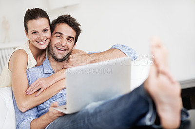 Buy stock photo Portrait, laptop and relax with couple on sofa in home for travel planning, bonding and relationship. Hug, holiday budget or honeymoon research with people in house for connection, support or space