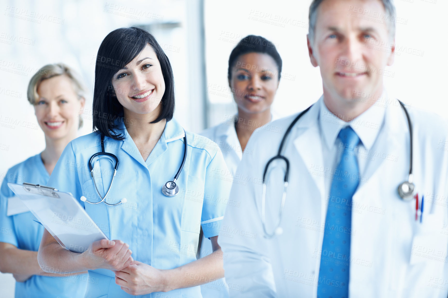 Buy stock photo Nurse, portrait and clipboard with woman in hospital for healthcare mission, solidarity and consulting. Medical, community and about us with people in clinic for support, doctor and collaboration