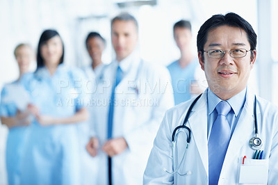 Buy stock photo Doctor, portrait and glasses with man in hospital for healthcare mission, solidarity and consulting. Medical, community and about us with people in clinic for support, nurses and collaboration
