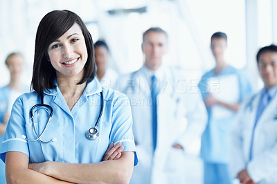 Buy stock photo Arms crossed, portrait and smile with nurse in hospital for healthcare mission, solidarity and consulting. Medical, community and about us with people in clinic for support, doctors and collaboration