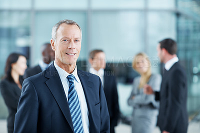 Buy stock photo Portrait, mature and happy with business man in conference for financial summit, coworkers and about us. Broker convention, workshop event and seminar with leadership in lobby for tradeshow forum