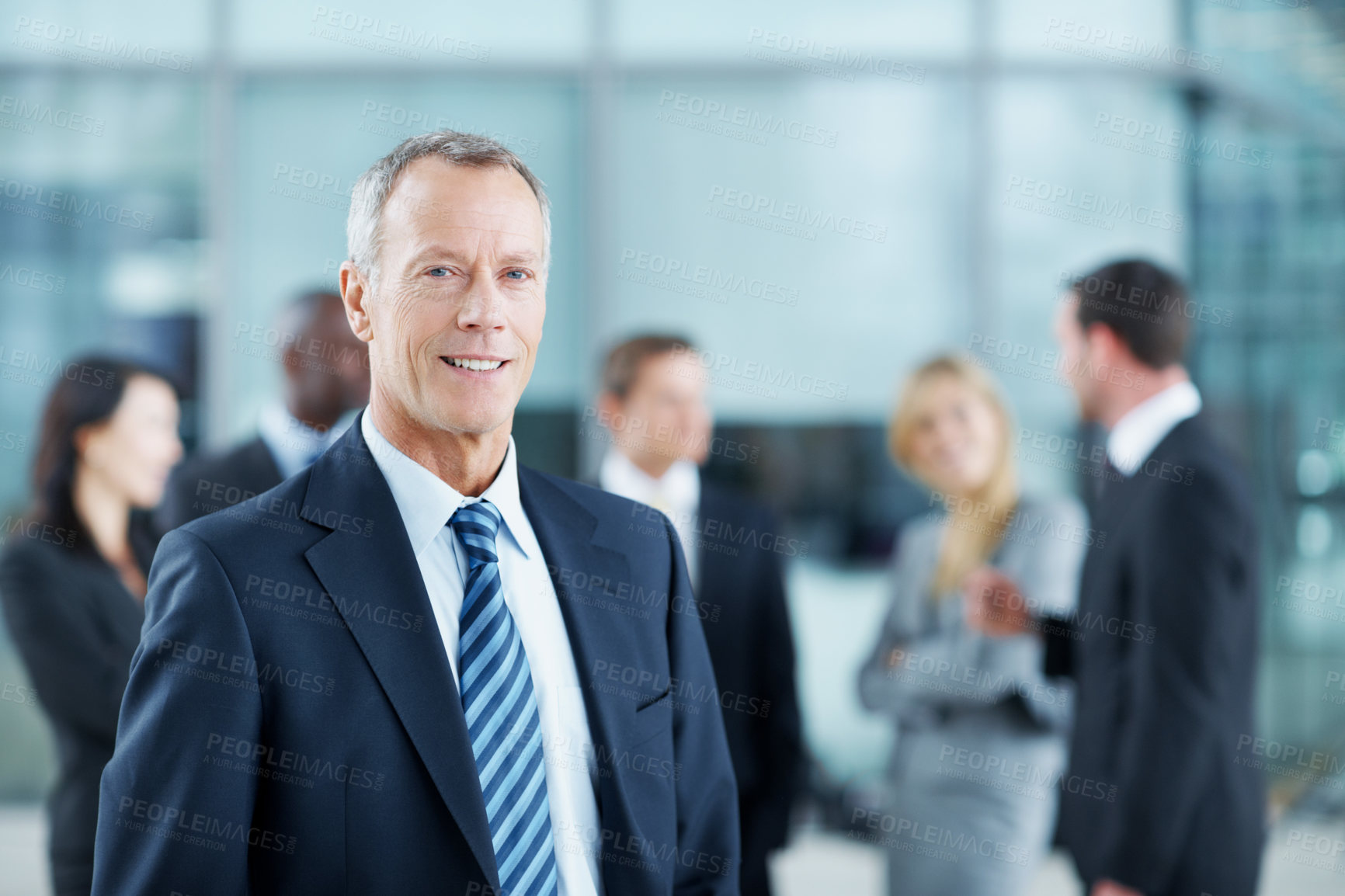 Buy stock photo Portrait, mature and happy with business man in conference for financial summit, coworkers and about us. Broker convention, workshop event and seminar with leadership in lobby for tradeshow forum