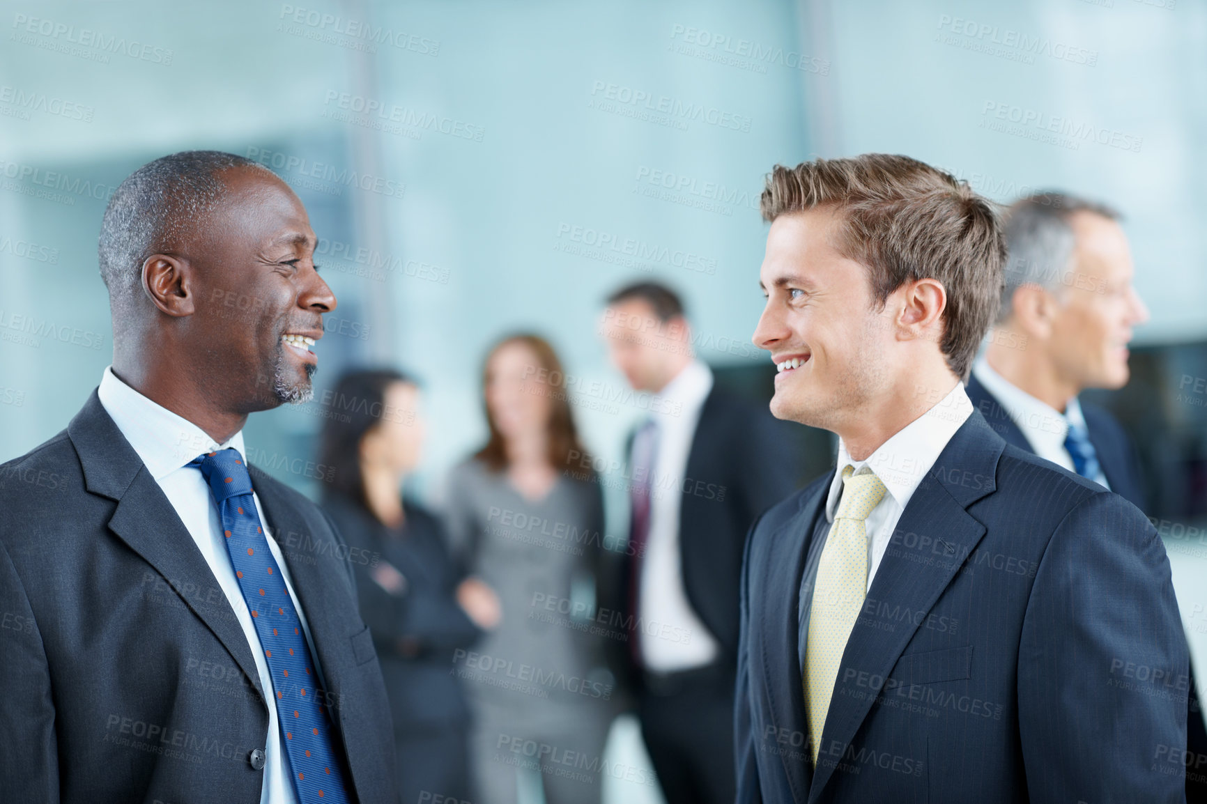 Buy stock photo Meeting, conference and smile with business people in office for networking event, expo and team. Corporate summit, conversation and convention with employees in lobby at seminar for discussion