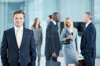 Buy stock photo Portrait, expo and smile with business man in conference for financial summit, coworkers and about us. Broker convention, workshop event and seminar with employee in lobby for tradeshow forum