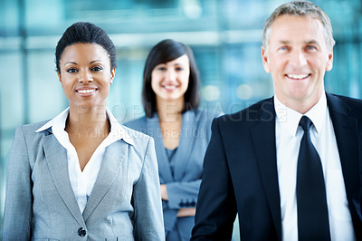 Buy stock photo Team, portrait and smile with business woman at conference for mission, corporate seminar and pride. Solidarity, financial summit and workshop with employees in lobby for b2b event and about us