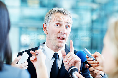 Buy stock photo Interview, scandal and microphone with business man in office for insider trading, journalist and speaker. Market manipulation, press release and news broadcast with people  for information leak