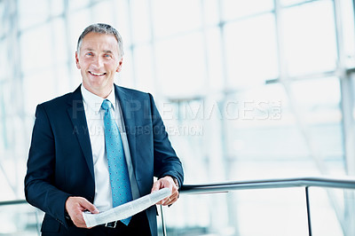 Buy stock photo Business man, happy and newspaper in office, professional portrait and real estate auction news. Property development, mature person and daily paper with listing opportunity, building lobby and space