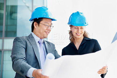 Buy stock photo Blueprint, architect and smile with business people in city for urban developer, engineer and team. Construction layout, floor plan and reading with employees for meeting and project management