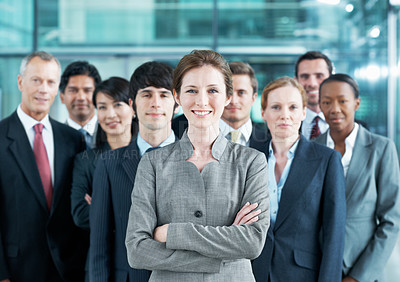 Buy stock photo Mission, leader and portrait of business woman at conference for networking expo, seminar and convention. Tradeshow event, corporate and arms crossed with employees in lobby for about us and forum
