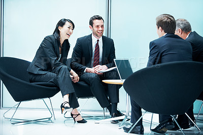 Buy stock photo Laptop, meeting and laugh with business people in office for sales projection, stakeholder and research. Treasurer budget, digital review and revenue planning with employees in lobby for funny joke
