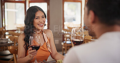 Buy stock photo Couple, wine and woman in restaurant for date, bonding and celebrate anniversary with drinks. Happy, fine dining and people with alcohol for romantic dinner, relationship and conversation for love