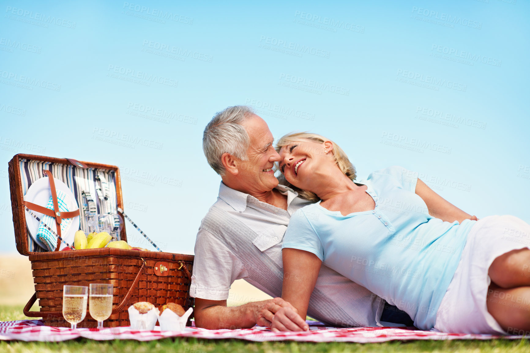 Buy stock photo Laugh, love and relax with old couple at picnic for connection, bonding and anniversary date. Retirement, funny and romantic lunch with senior man and woman in nature for support and vacation