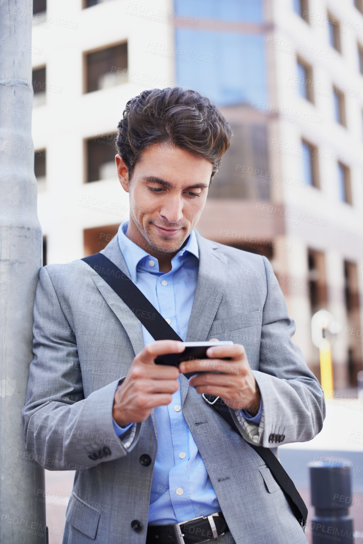 Buy stock photo Happy, businessman and city with phone for social media, outdoor network or connection. Man, employee or user playing with smile on smartphone for online entertainment, urban town and sidewalk. 