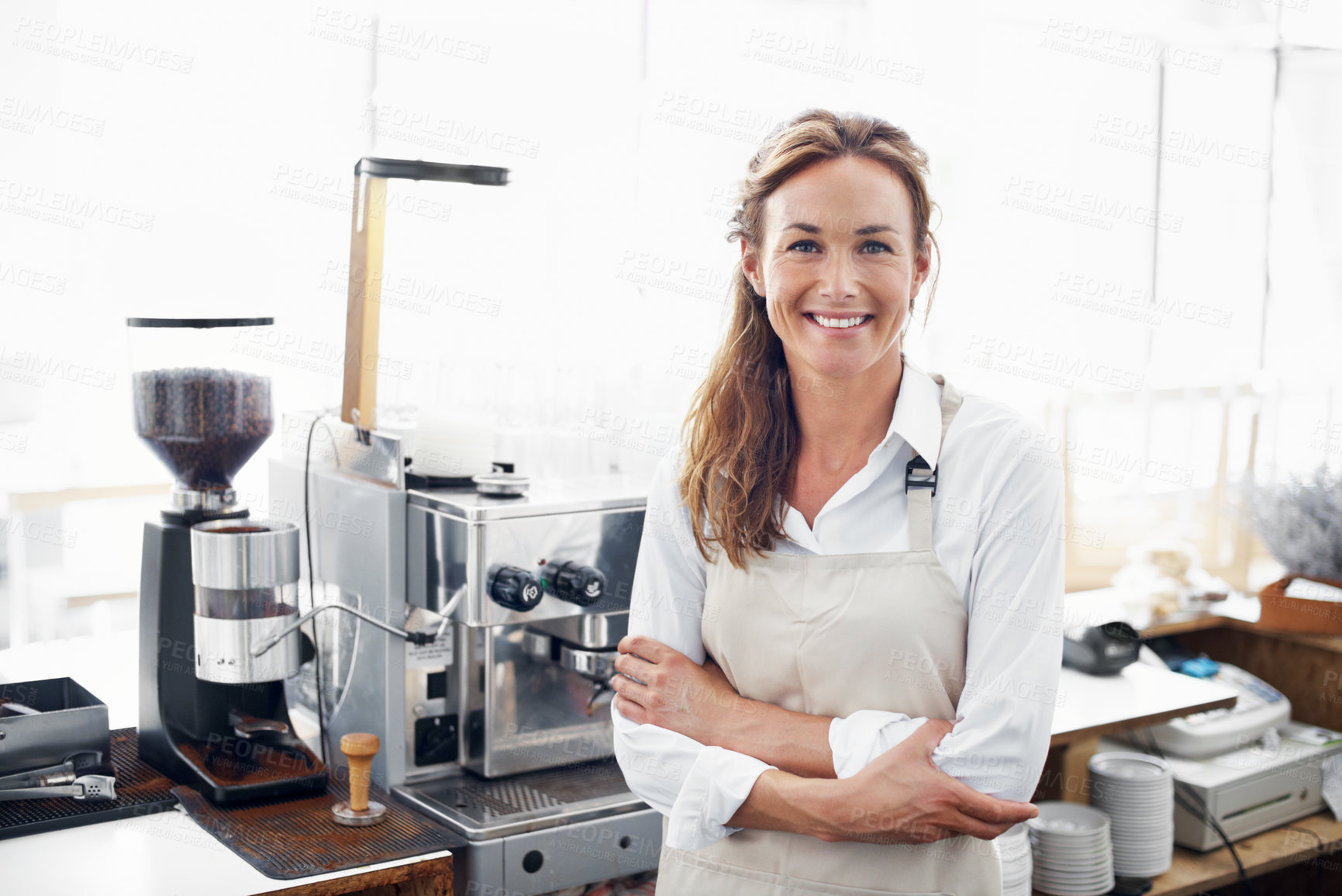 Buy stock photo Hospitality, portrait or woman in cafe with arms crossed, serving career or about us as waitress. Happy, pride or barista with confidence, catering profession or ambition in restaurant industry.