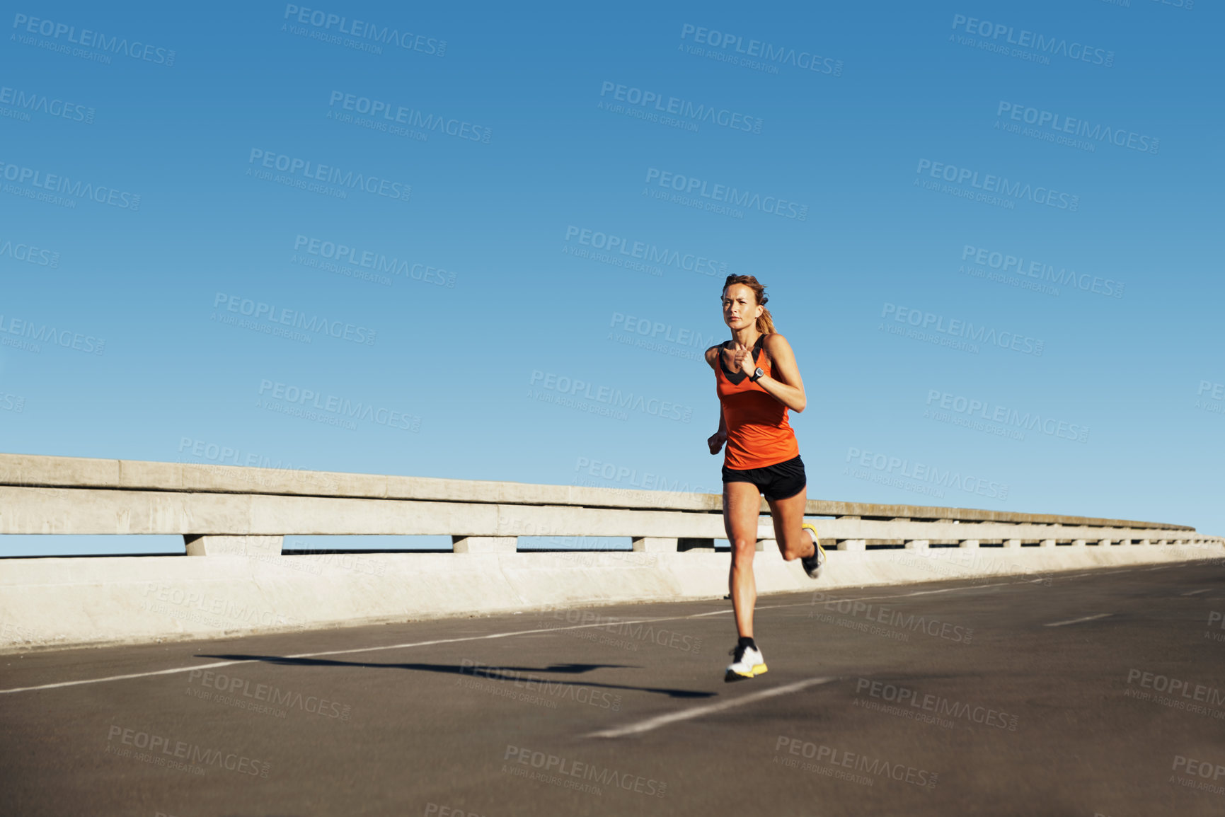 Buy stock photo Fitness, woman and running workout on bridge for speed challenge, cardio and physical activity. Mockup space, fast athlete and sprint on highway for exercise, sport performance and interval training