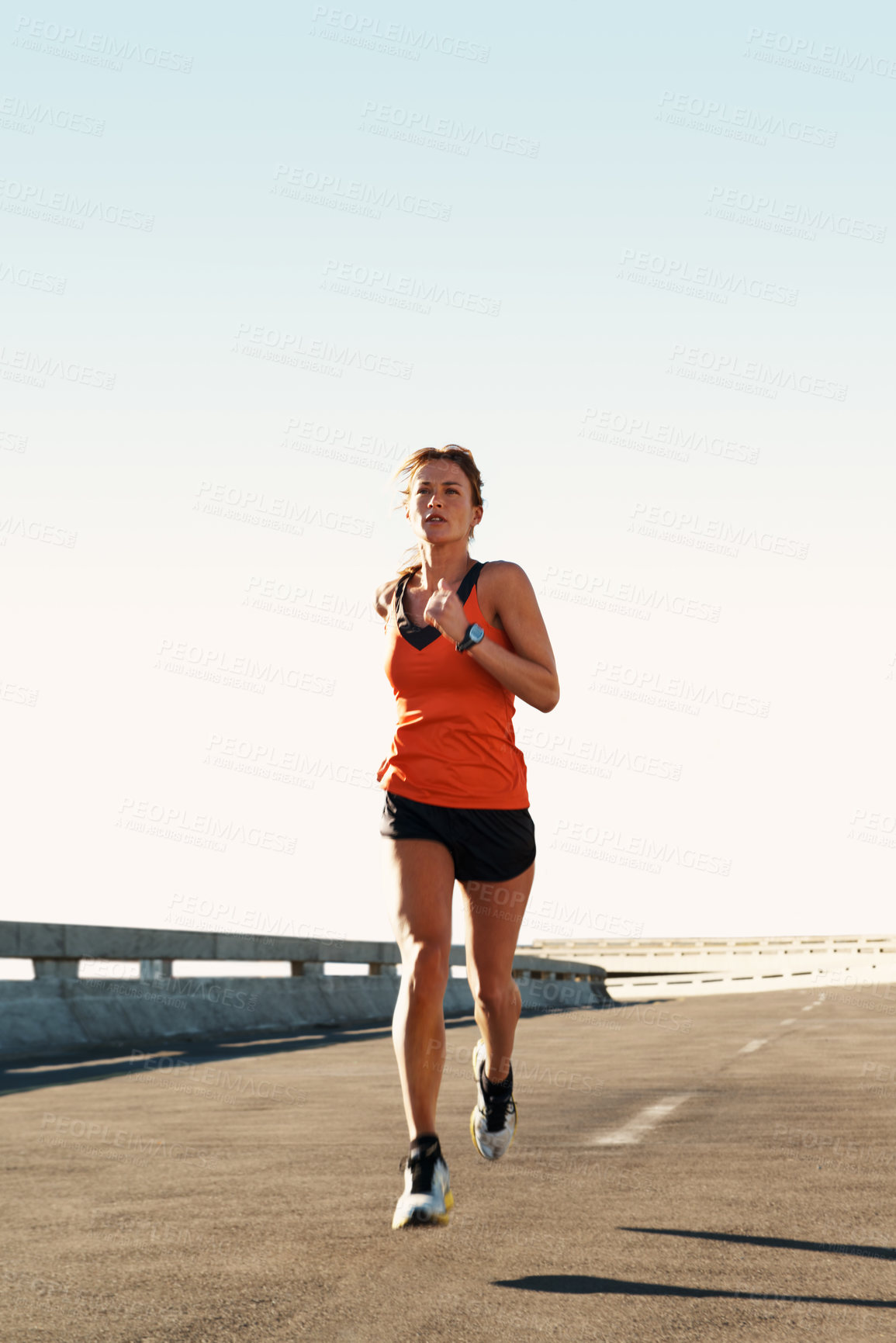 Buy stock photo Active, woman and running for fitness on bridge with health training, morning cardio or endurance. Space, road and athlete with highway jog for exercise routine, wellness challenge or workout stamina