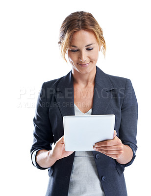 Buy stock photo Cropped shot of a smiling businesswoman using a digital tablet while isolated on white