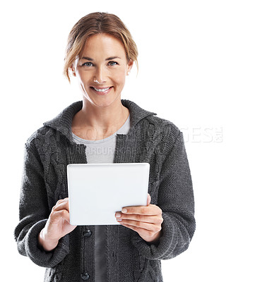 Buy stock photo A casually dressed woman using a digital tablet while isolated on white