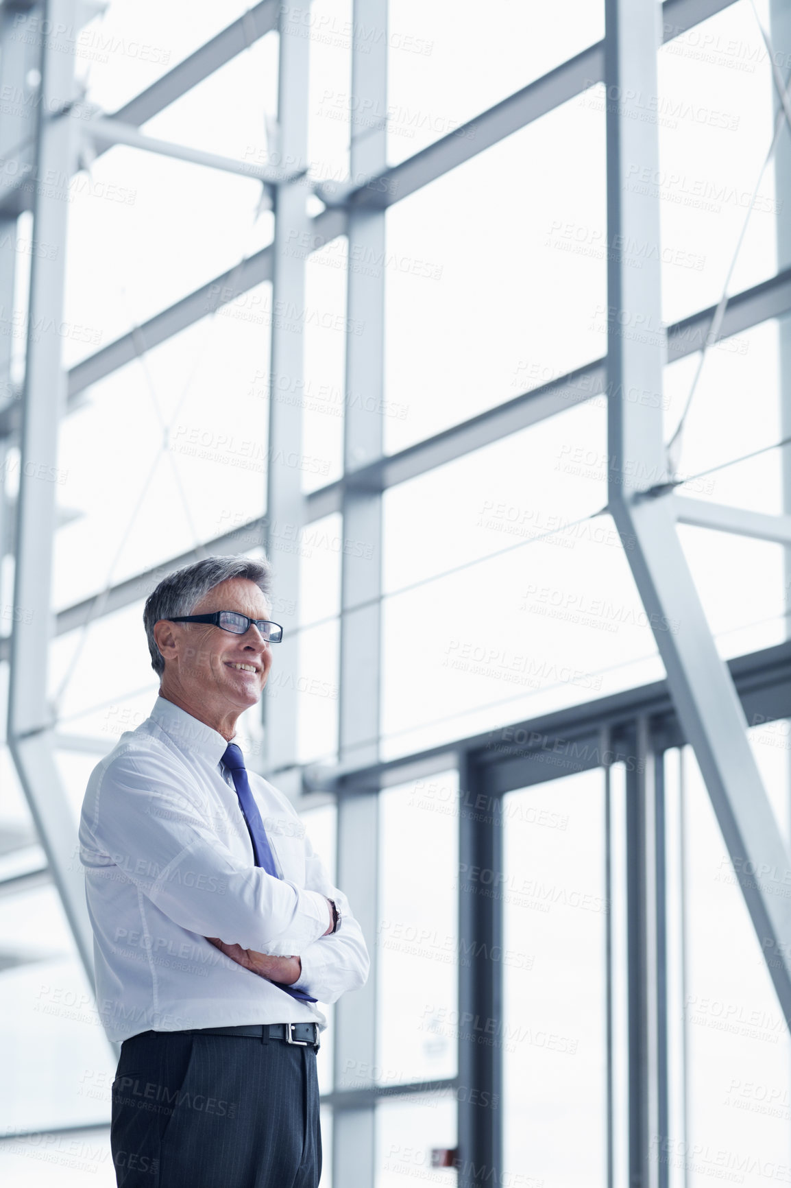 Buy stock photo Thinking, smile and arms crossed with business man in office for vision, insurance broker and ceo. Portfolio manager, reflection and claims advisor with mature employee in agency for risk management