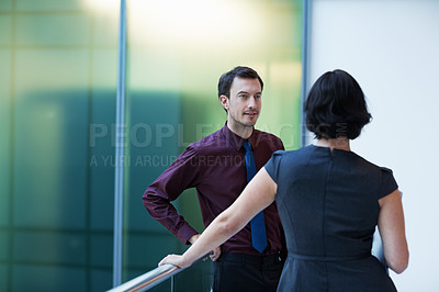 Buy stock photo Shot of two businesspeople having a conversation in an office setting