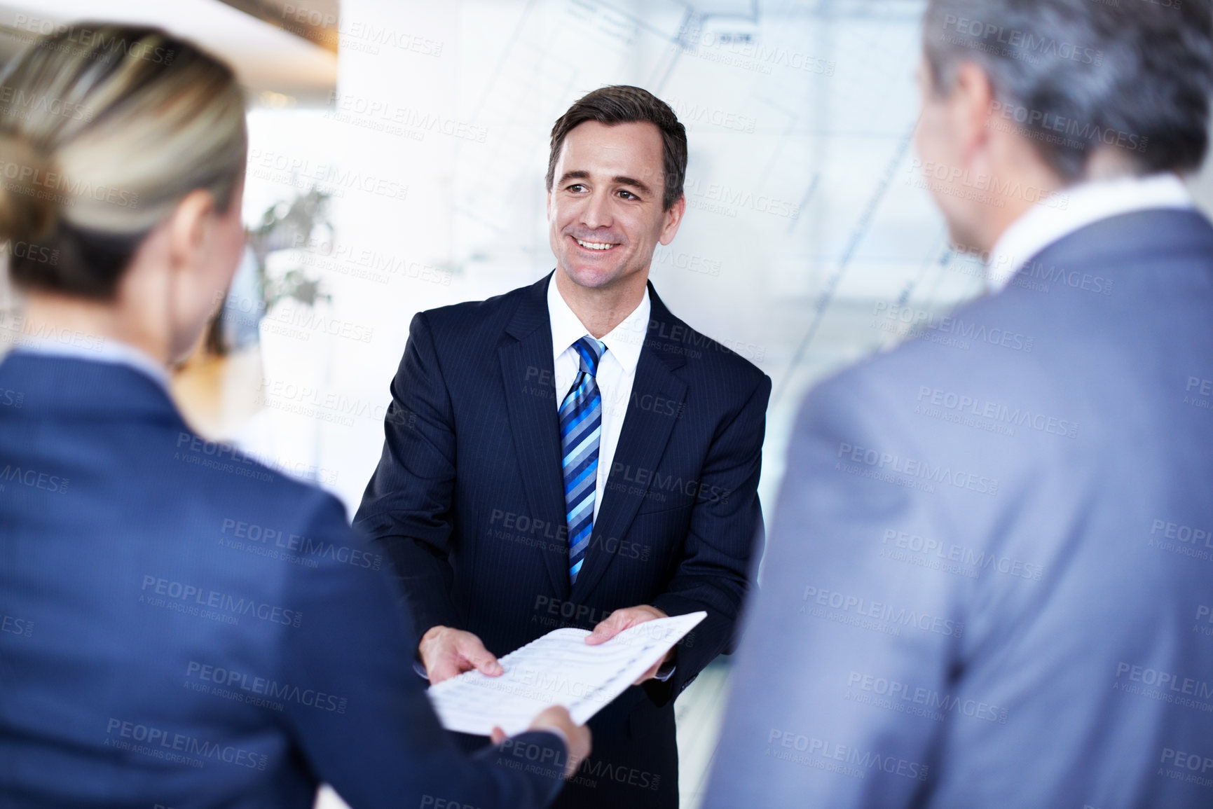 Buy stock photo Businessman, smile and document for onboarding, hiring process or hr question in office interview. Conversation, discussion and people with applicant for job opportunity, recruiting or review resume