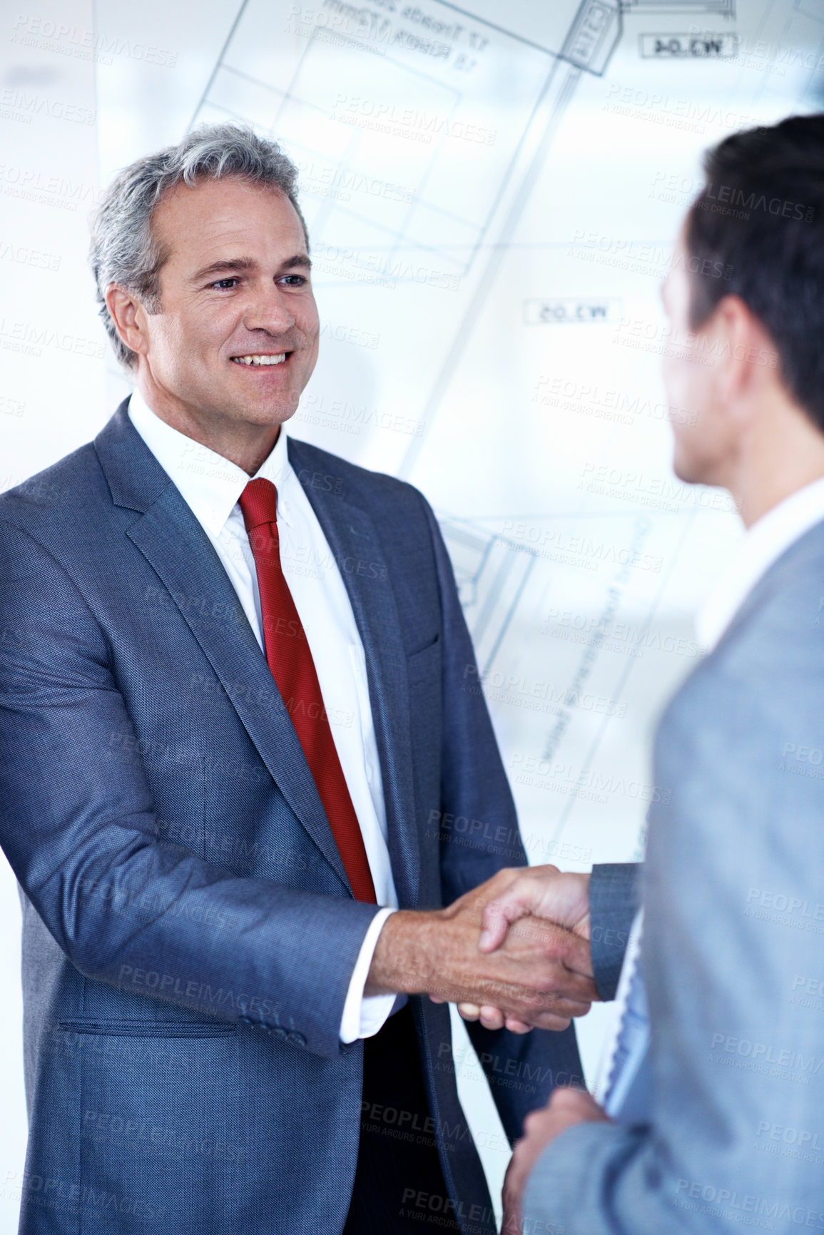 Buy stock photo Handshake, blueprint and business men in office with deal, agreement or building review together. Smile, team and contractor shaking hands with client for property development by floor plan overlay.