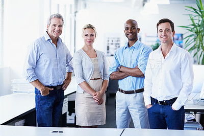 Buy stock photo Portrait of a diverse group of smiling coworkers in an office