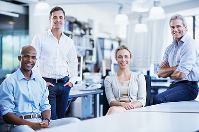 Buy stock photo Cropped portrait of a diverse group of confident coworkers in an office