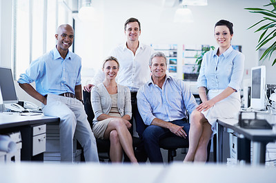 Buy stock photo Portrait of a diverse group of smiling coworkers in an office