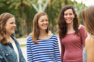 Buy stock photo Group of teen friends standing together and smiling while outdoors