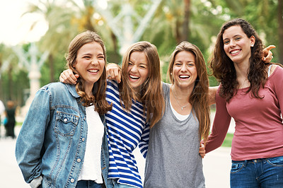 Buy stock photo Group of teen friends standing together and smiling while outdoors