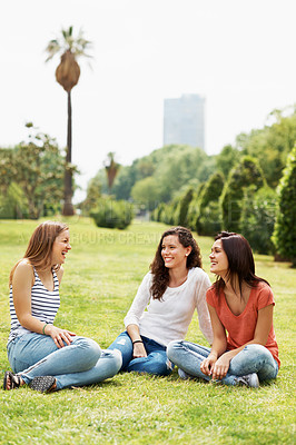 Buy stock photo Group of happy teen friends relaxing together outdoors on the grass