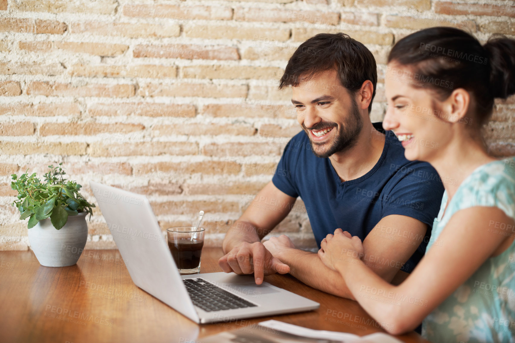 Buy stock photo Laptop, search and happy with couple in home for honeymoon trip, romantic vacation or love. Travel itinerary, online holiday package and tour catalogue with man and woman in dining room in house