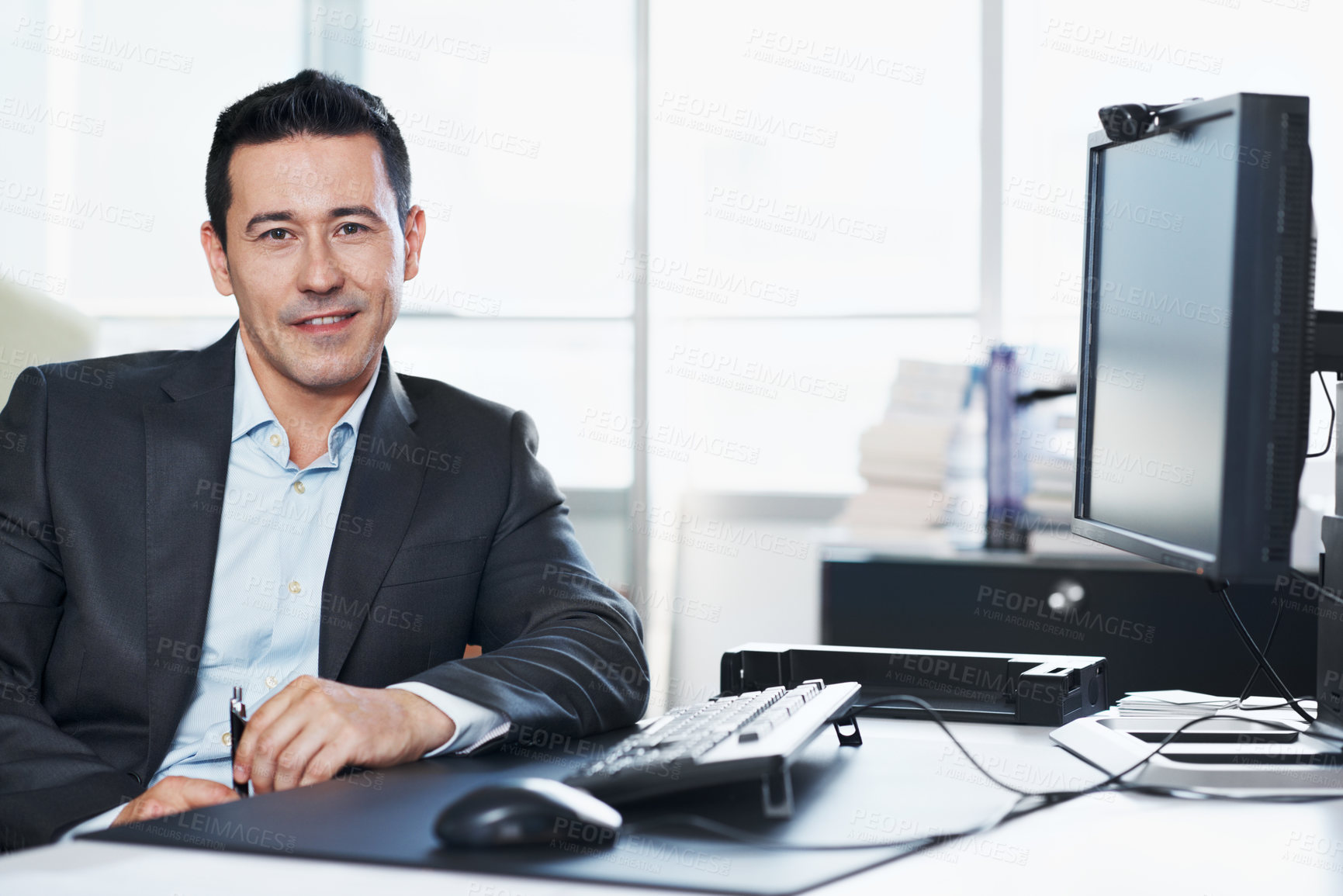 Buy stock photo Man, portrait and smile at computer for business, finance and company representative at desk. Accountant, tech and happy in accounting firm for administration, about us and professional in office