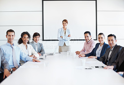 Buy stock photo A group portrait of staff members during a presentation