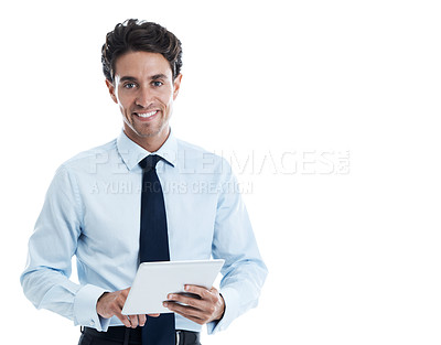 Buy stock photo Smiling young businessman using a digital tablet against a white background