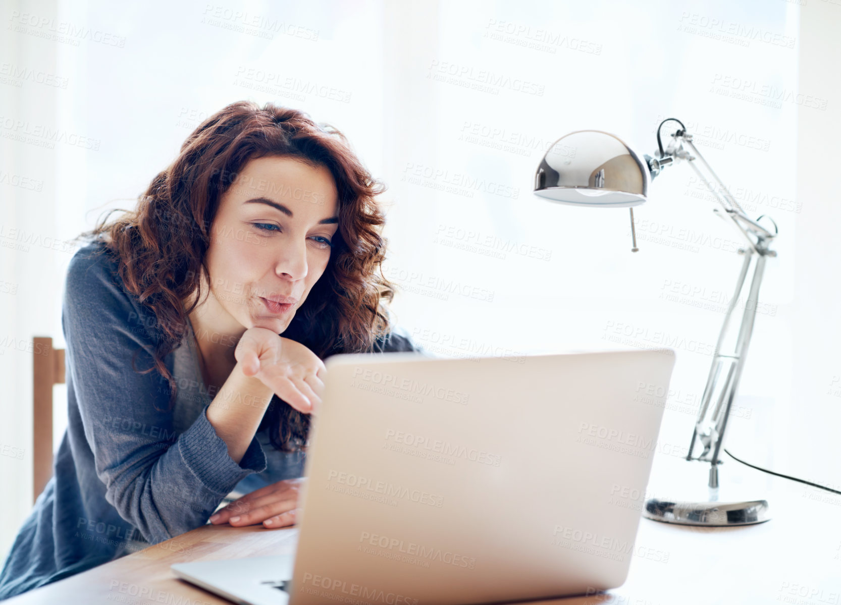 Buy stock photo Blowing kiss, laptop and video call with woman in home for live streaming, social media or flirt. Broadcast, content creation or connection with person in house for recording, happy and greeting